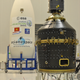 Archival image from 2013 showing the Vespa (Vega Secondary Payload Adapter) adapter in the background, with the Proba-V satellite in the foreground.